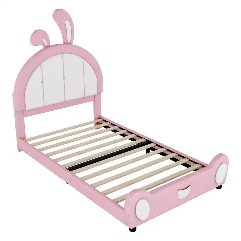 Lit plate-forme capitonné pour 1 personne avec oreilles de lapin roses et blanches
