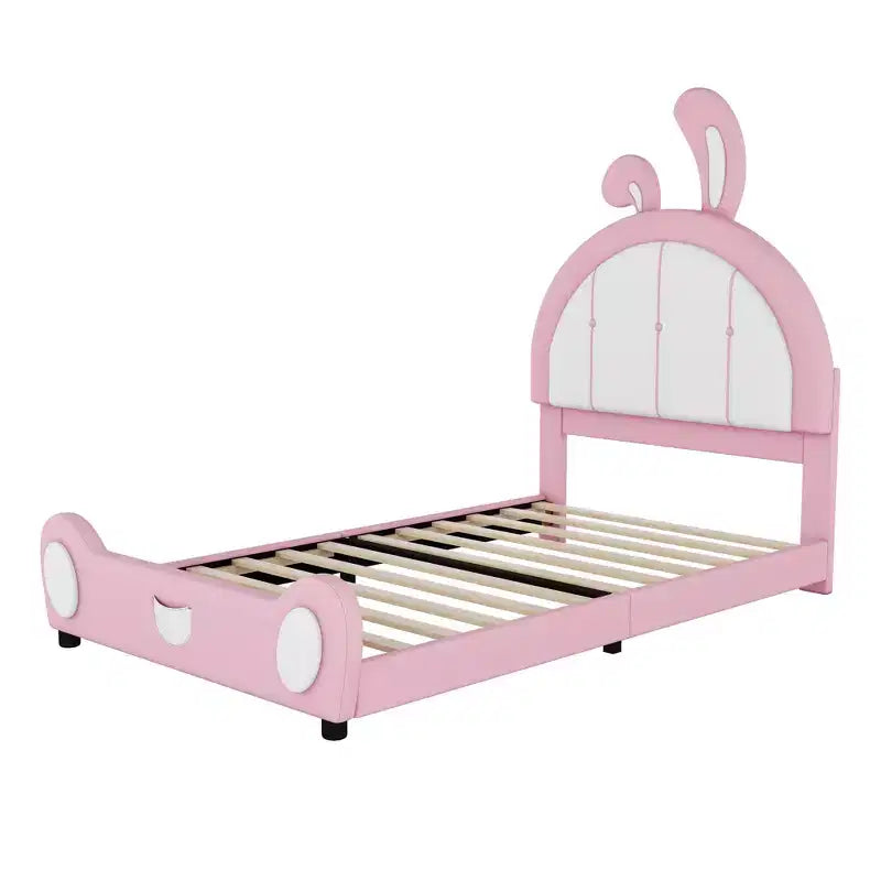 Lit plate-forme capitonné pour 1 personne avec oreilles de lapin roses et blanches