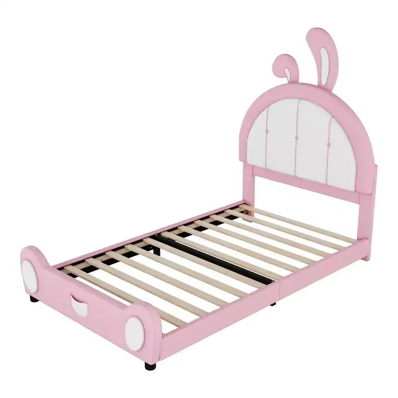 Lit plate-forme capitonné pour 1 personne avec oreilles de lapin roses et blanches